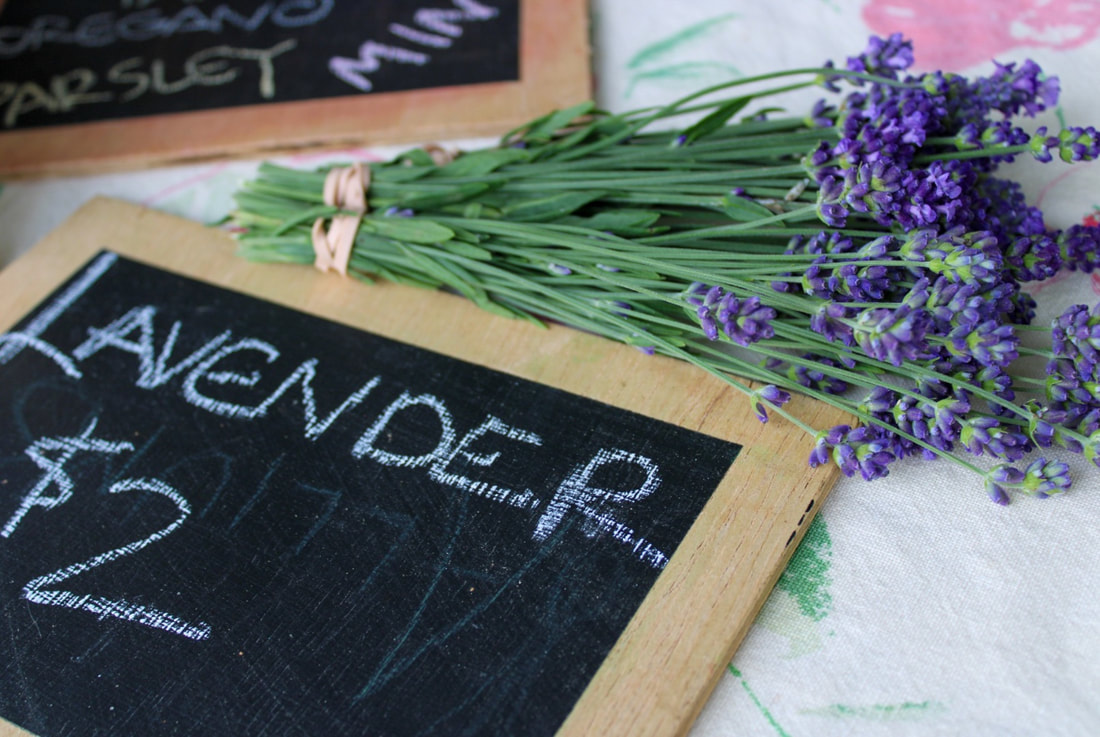 Lavender bouquet and chalkboard sign